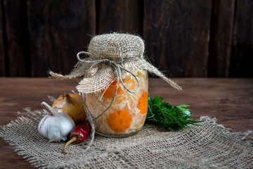 Sauerkraut with carrot in a glass jar