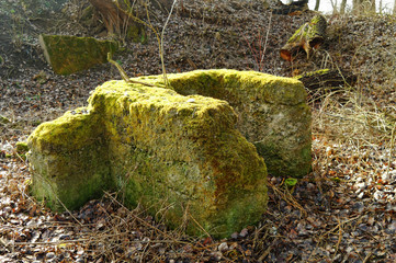 mossy damaged concrete fragment of the fortress