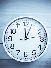 wall clock on wood