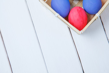 Happy Easter eggs in basket