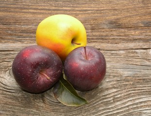 Apples on wooden background