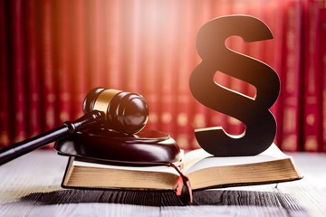 Gavel and wooden paragraph the symbols of law