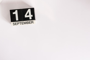 September 14th. Image of september 14 wooden office calendar on white background. Autumn day. Empty space for text