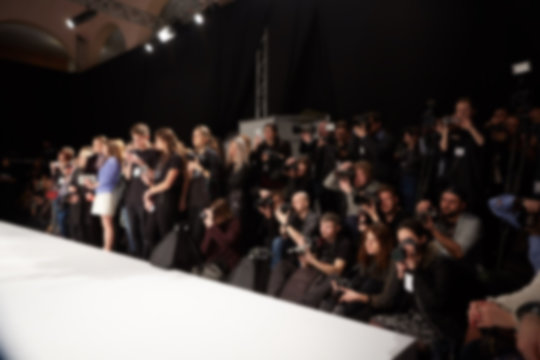 Blurred Image Of Group Audience At Fashion Show Stage