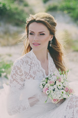 Amazing Happy young woman in wedding dress