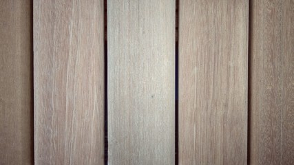 Wood panels run vertical along an interior wall.