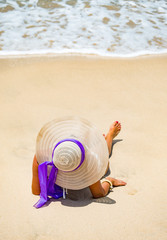 Fototapeta na wymiar Woman in bikini at tropical beach