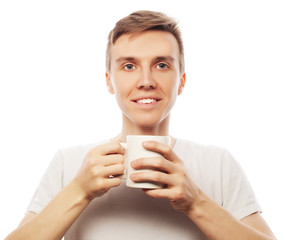 man holding white cup with coffee