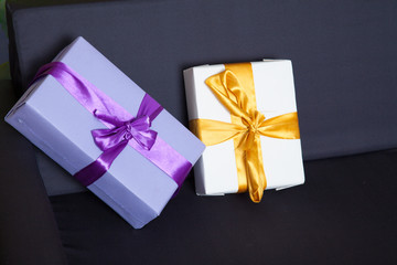 two gift boxes white and violet