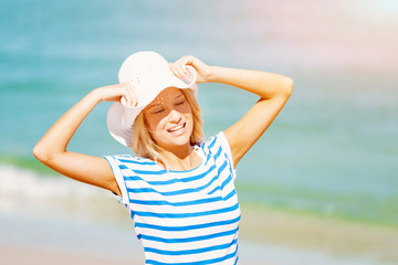 Young woman relaxing on the beach