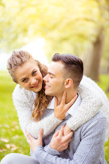 Young couple walking, Hyde Park, London: sunset colour tone