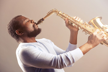 Fototapeta na wymiar African American jazz musician playing the saxophone