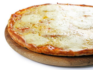 Pizza full of cheese on wooden board isolated on white background, close up