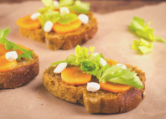 Healthy sandwich with carrots, celery and cheese