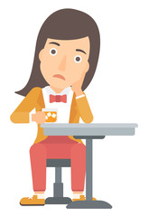 Woman sitting at bar.