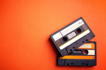 Fototapeta premium Old audio cassettes on red background