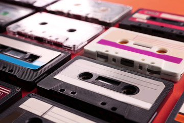 Obraz premium Set of old audio cassettes on red background