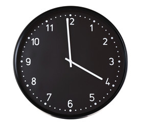 Fototapeta na wymiar Round black wall clock, isolated on white