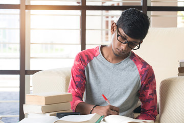 indian college student doing homework