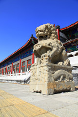 Fototapeta na wymiar Chinese classical architecture and stone lions