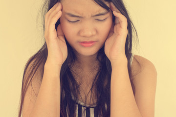 Naklejka premium Woman having a headache.Vintage filtered image.
