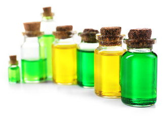 Bottles of tea oil, isolated on white