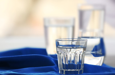 Glasses of water on a  napkin, close up