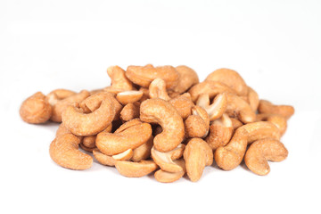 closeup of roasted cashew on white background