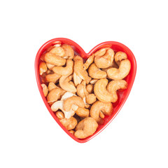 heart shape from cashew. Isolated on a white