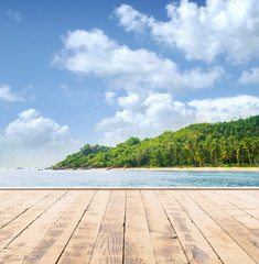 Wooden pier, exotic sea and a blue sky