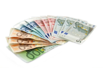 Fan of different euro banknotes, isolated on white