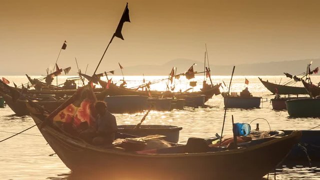 Closeup Fishing Boat Silhouettes in Sea Bay at Sunset in Vietnam