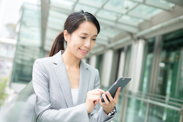 Businesswoman use of smart phone