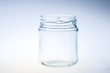 decorated clean glass jar againt light background