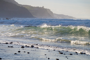 Rocks and stormy waves on Playa El Socorro beach