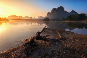 Beautiful sunrise landscape at lake in Phang nga province, Thailand.