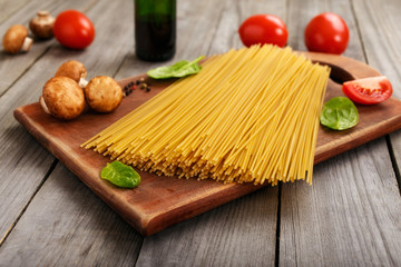 Italian spaghetti on a wooden table