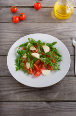 salad of arugula, tomato and mozzarella
