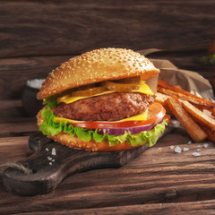 burger closeup on wooden background