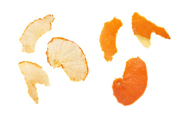 Naklejka premium Parts of tangerine peel isolated on white background