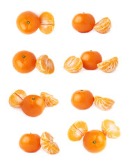 Half and fresh juicy tangerine fruit isolated over the white background