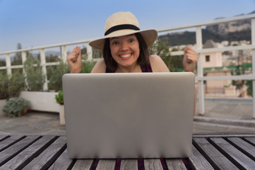 Happy woman and laptop