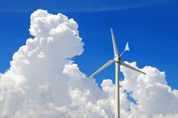 Wind turbine on blue sky and many clouds background, (with clipping path)
