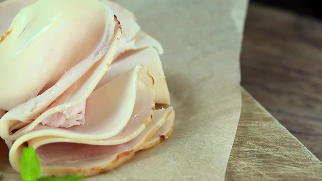 Rotating Chicken Breast Sausage as not loopable 4K UHD footage