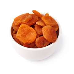 Fototapeta na wymiar Dried orange apricots over white background