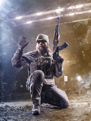 Brave special forces soldier is giving the sign to others soldiers
