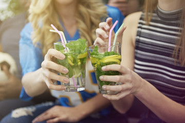 Close up of girls with drinks
