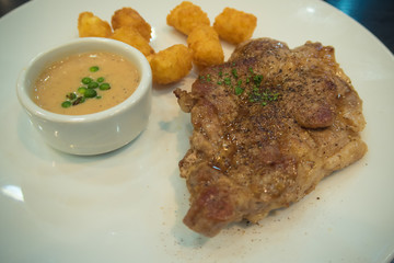 steak with fried potatoes