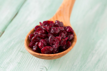 cranberry on wooden surface