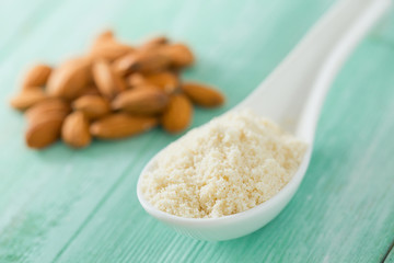 almond flour on wooden surface